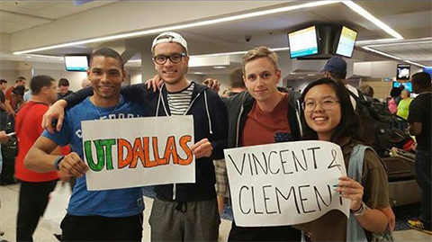 more global business students cheerfully picking up ut dallas exchange students at the airport