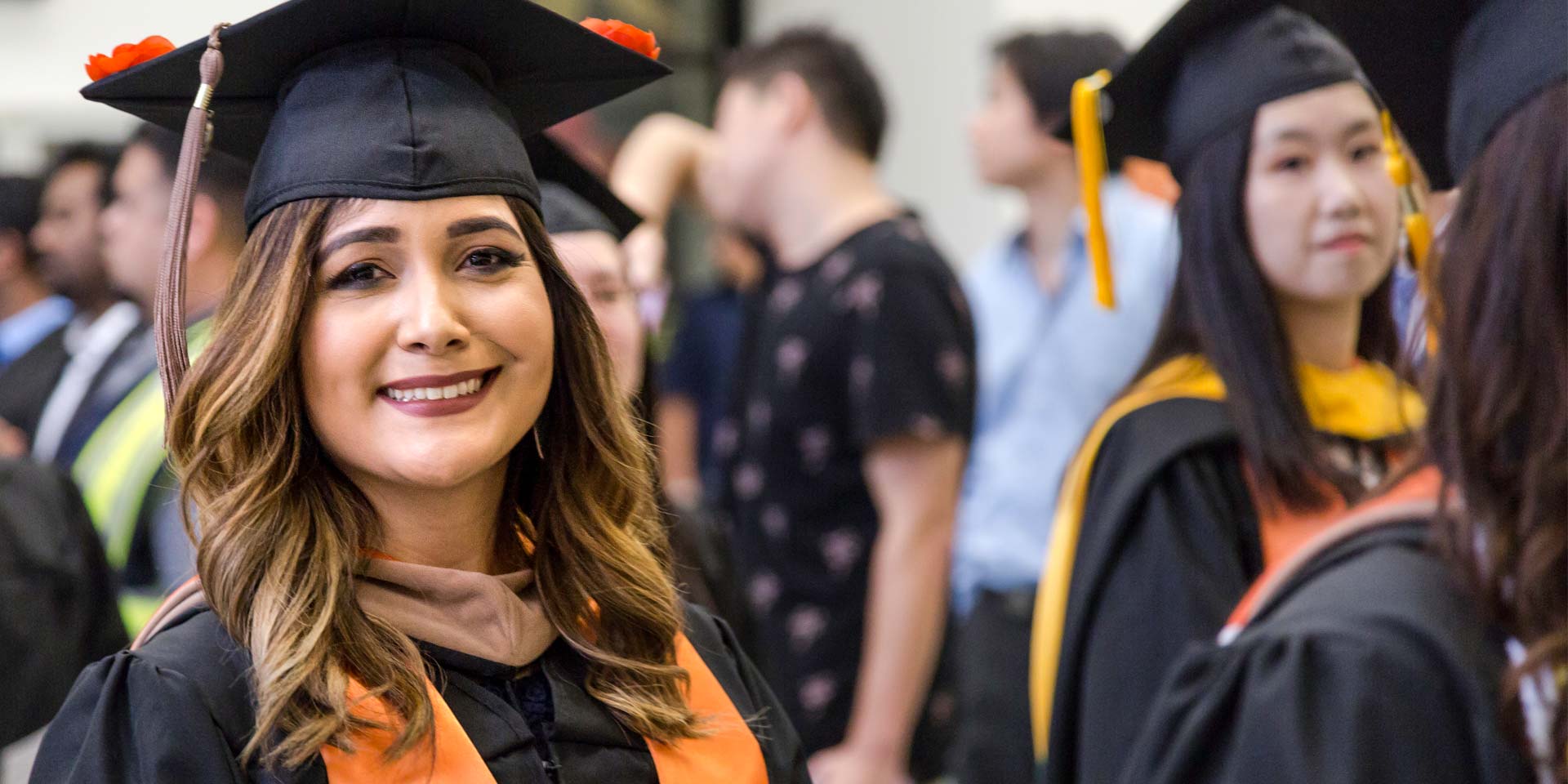 Jindal School master's in healthcare leadership and management graduate on UT Dallas commencement day