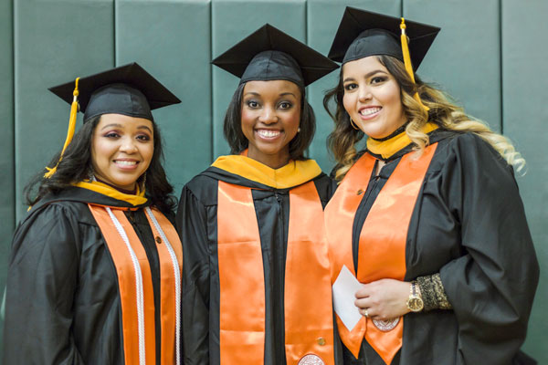 Stefanie Johnson, Elizabeth Henderson and Maria Dominguez graduated with master’s degrees in healthcare management.