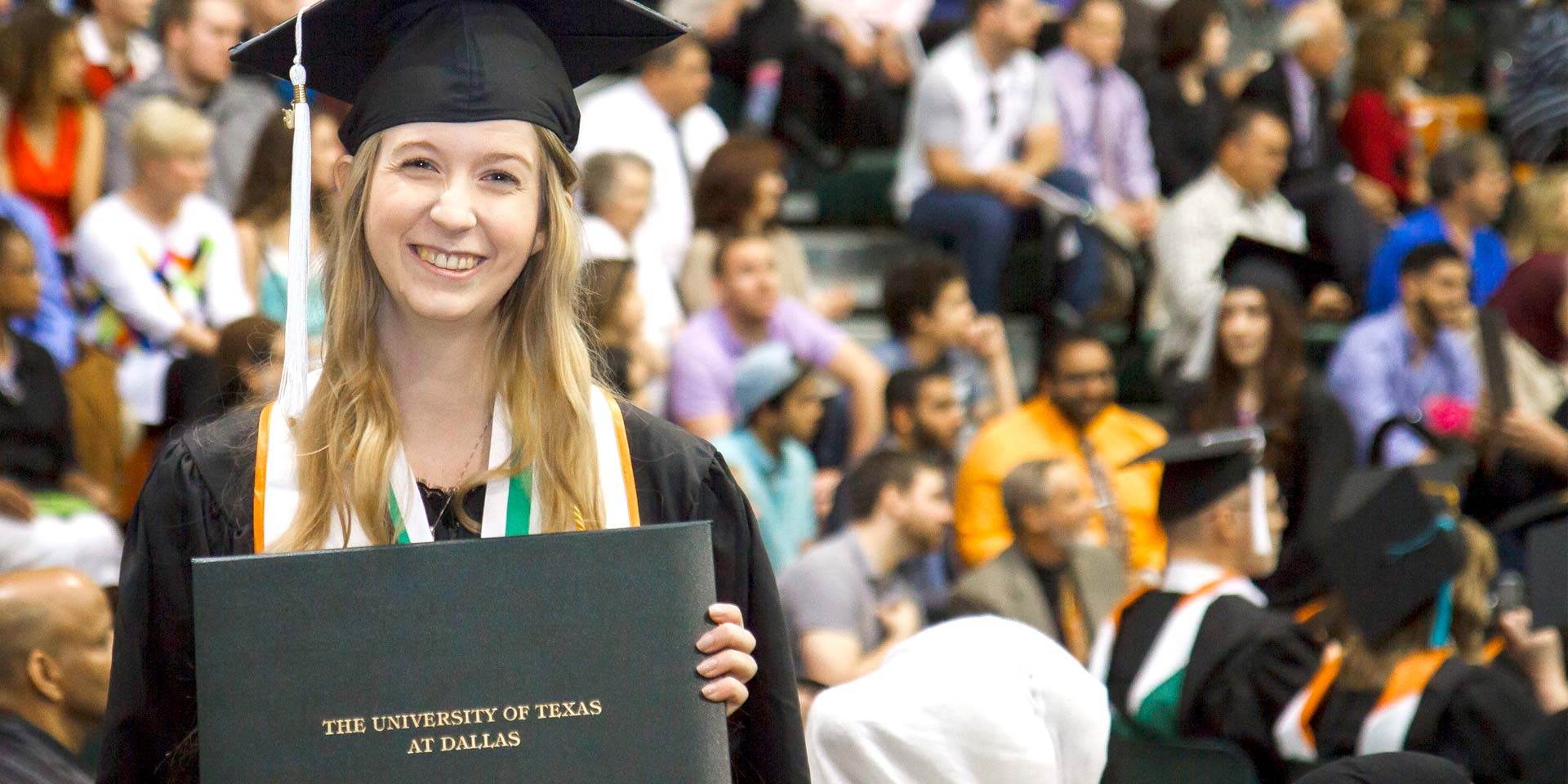 Jindal School bachelor's in human resource management graduate on UT Dallas commencement day